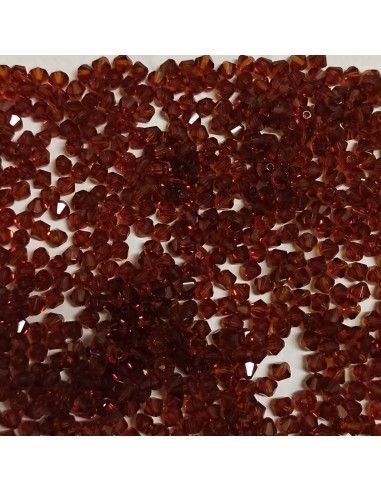 Bicono in Cristallo GT Crystal mm 6 Dark Topaz - 144PZ Bicono in Cristallo GT Crystal mm 6 Dark Topaz - 144PZ