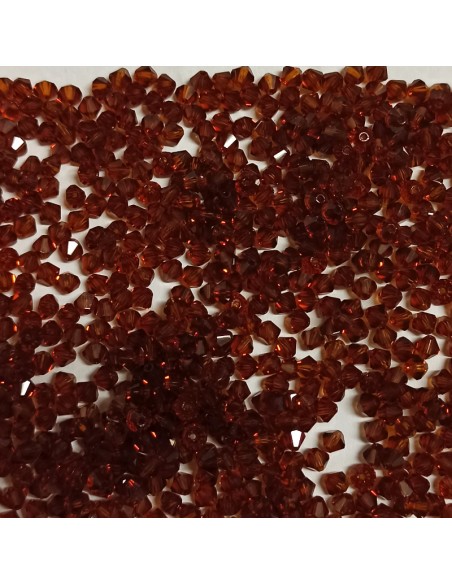 Bicono in Cristallo GT Crystal mm 6 Dark Topaz - 144PZ Bicono in Cristallo GT Crystal mm 6 Dark Topaz - 144PZ